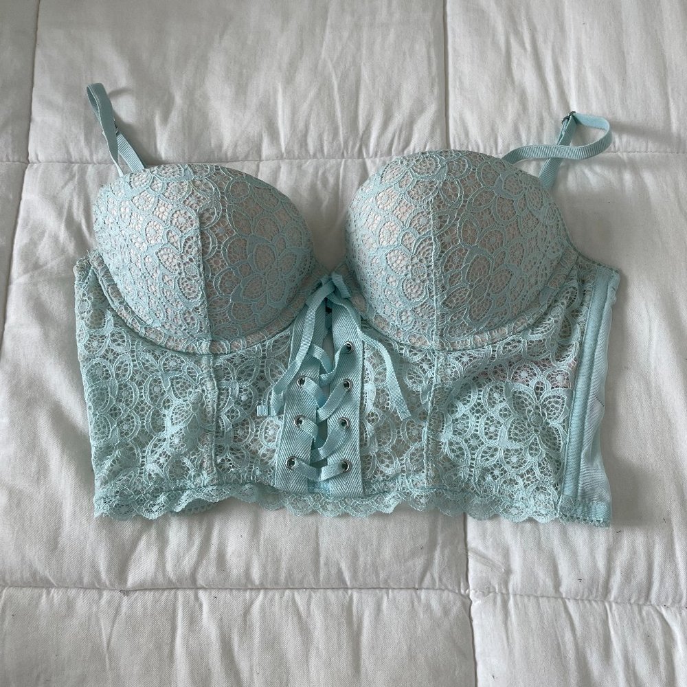 A vintage-inspired bra top features floral lace,